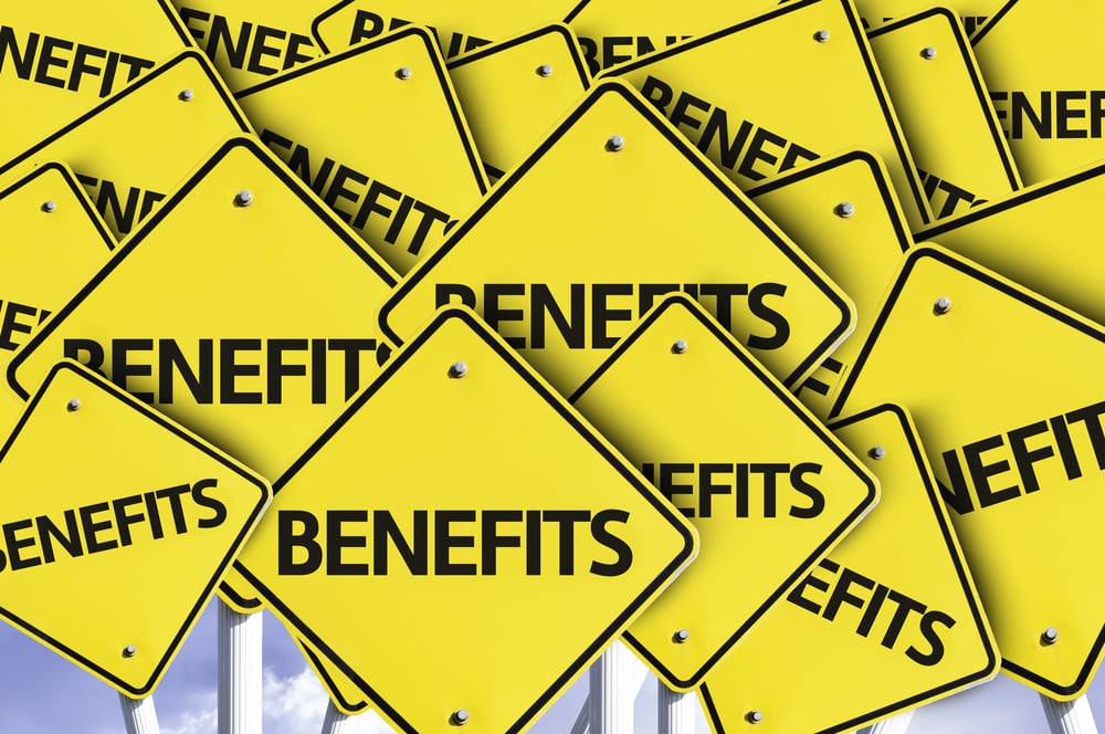 Benefits written on multiple road sign